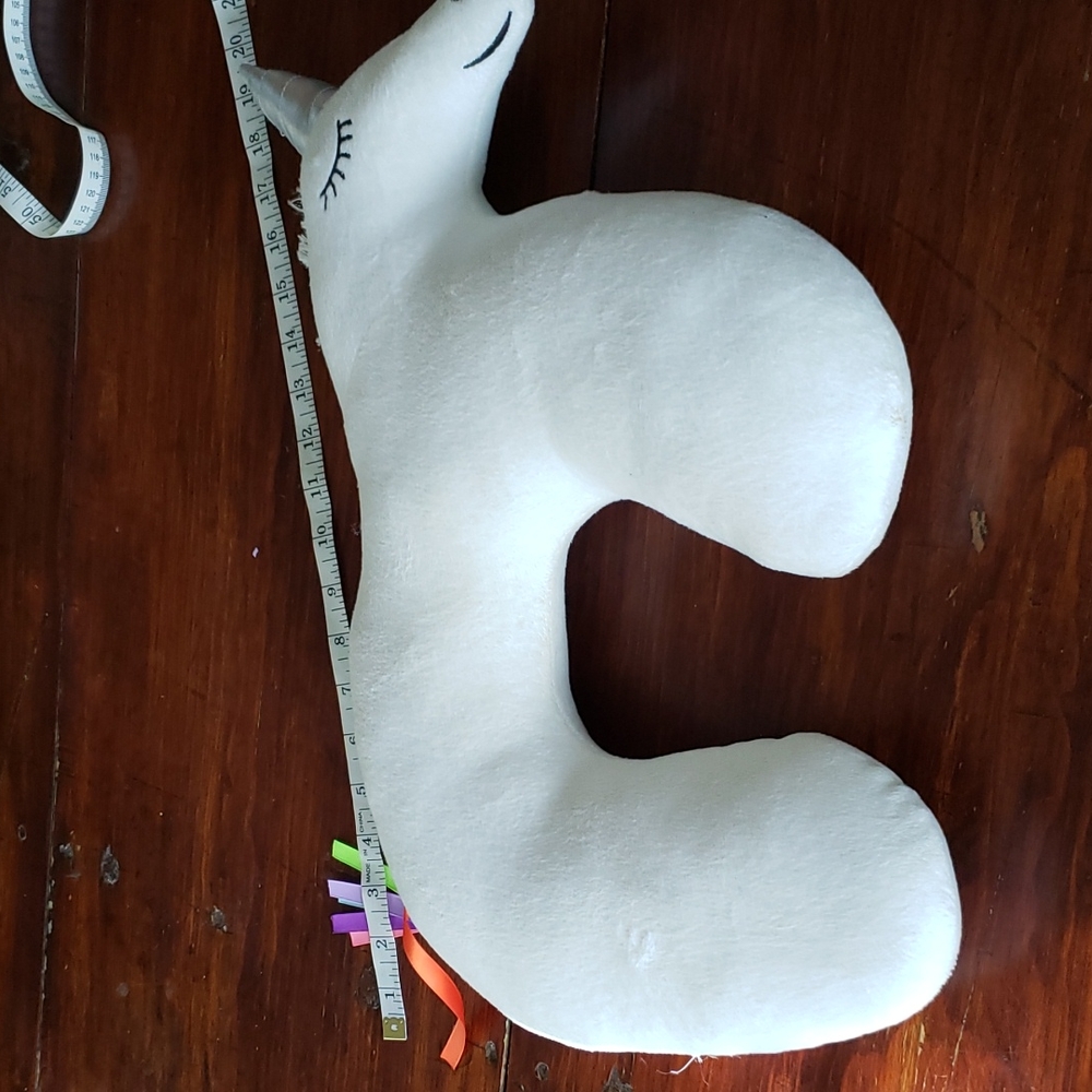 Nwot neck pillow. Fun unicorn shape.great for airplane or car
